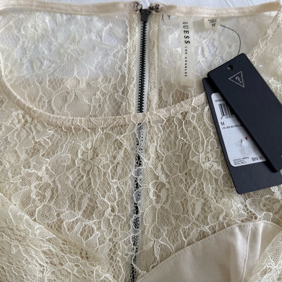 NOT FOR SALE
GUESS PEPLUM BLOUSE TOP
CREAM LONG SLEEVE BACK ZIP - Picture 6 of 12